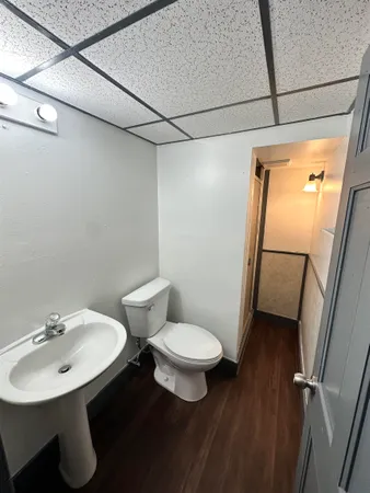 a bathroom with a sink and mirror