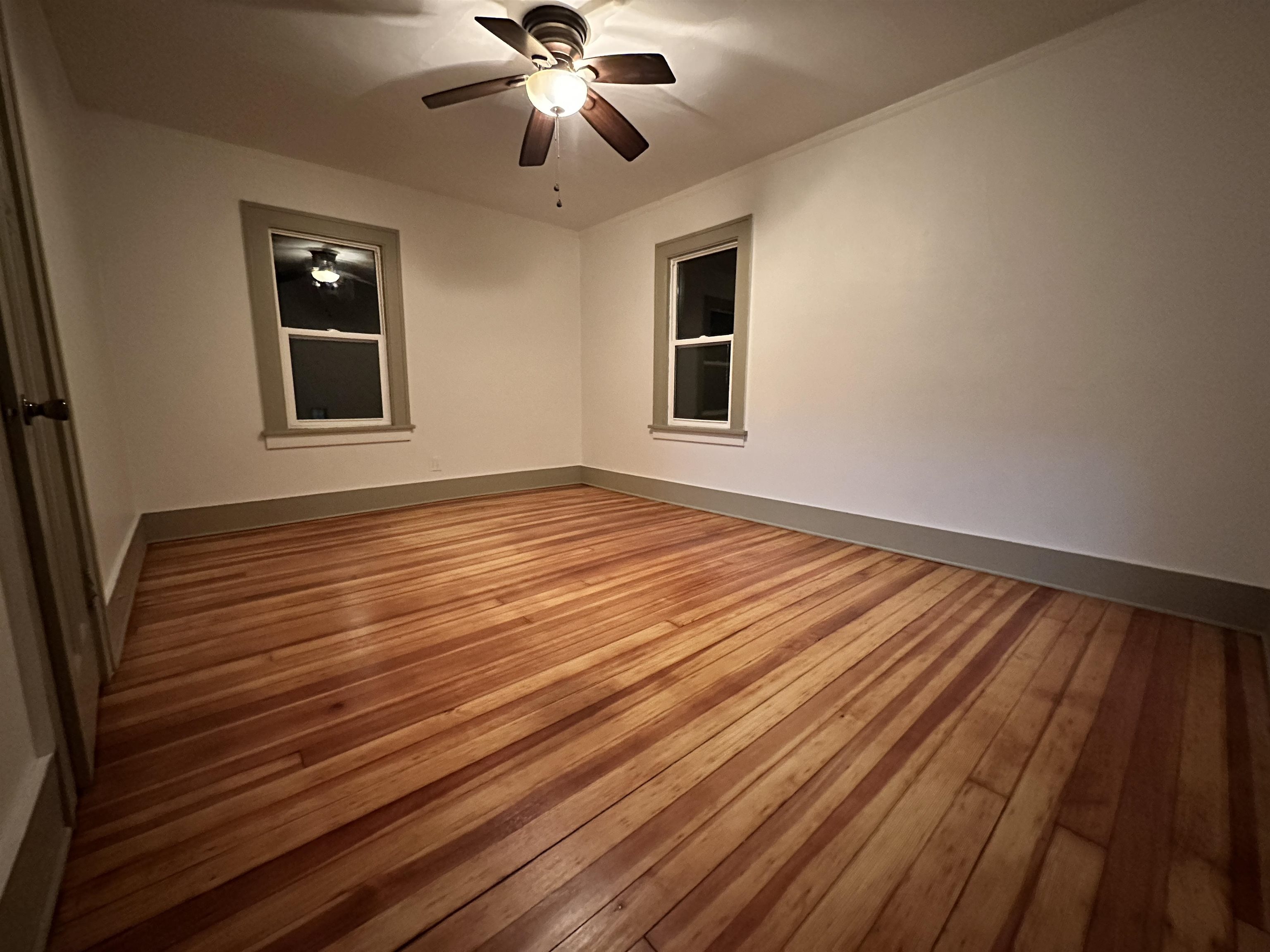 816 South Harlem Avenue Freeport, IL 61032 - Photo 26 of 33 a view of an empty room with wooden floor and a window