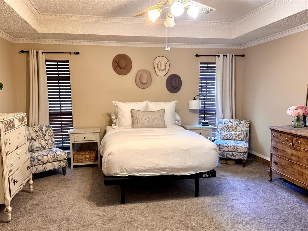 113 Northeast Timber Ridge Drive Burleson, TX 76028 - Photo 20 of 36 Relax in this Spacious & Private Primary Retreat!