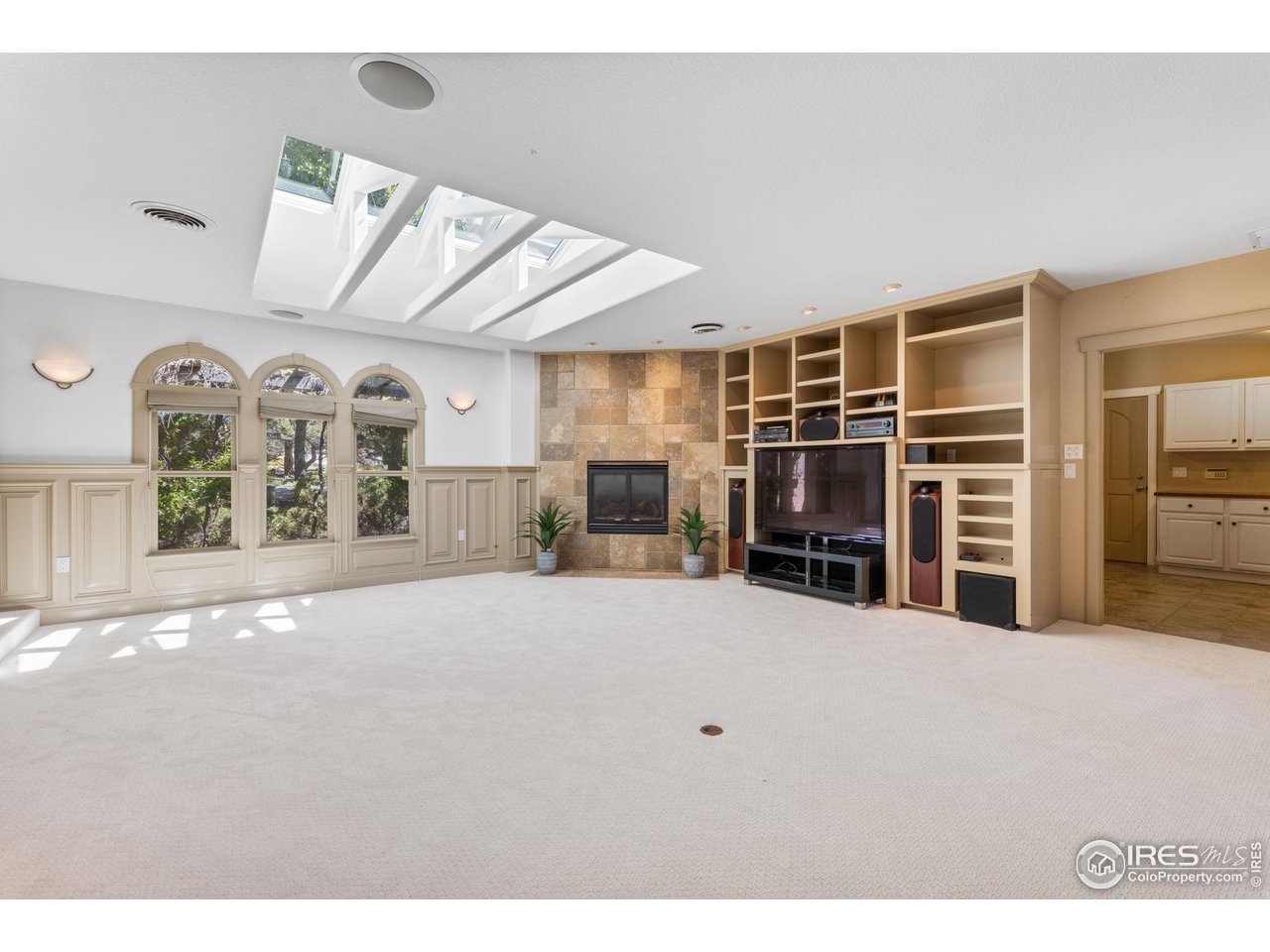 2210 Meadow Avenue Boulder, CO 80304 - Photo 16 of 40 a view of a livingroom with furniture and a ceiling fan