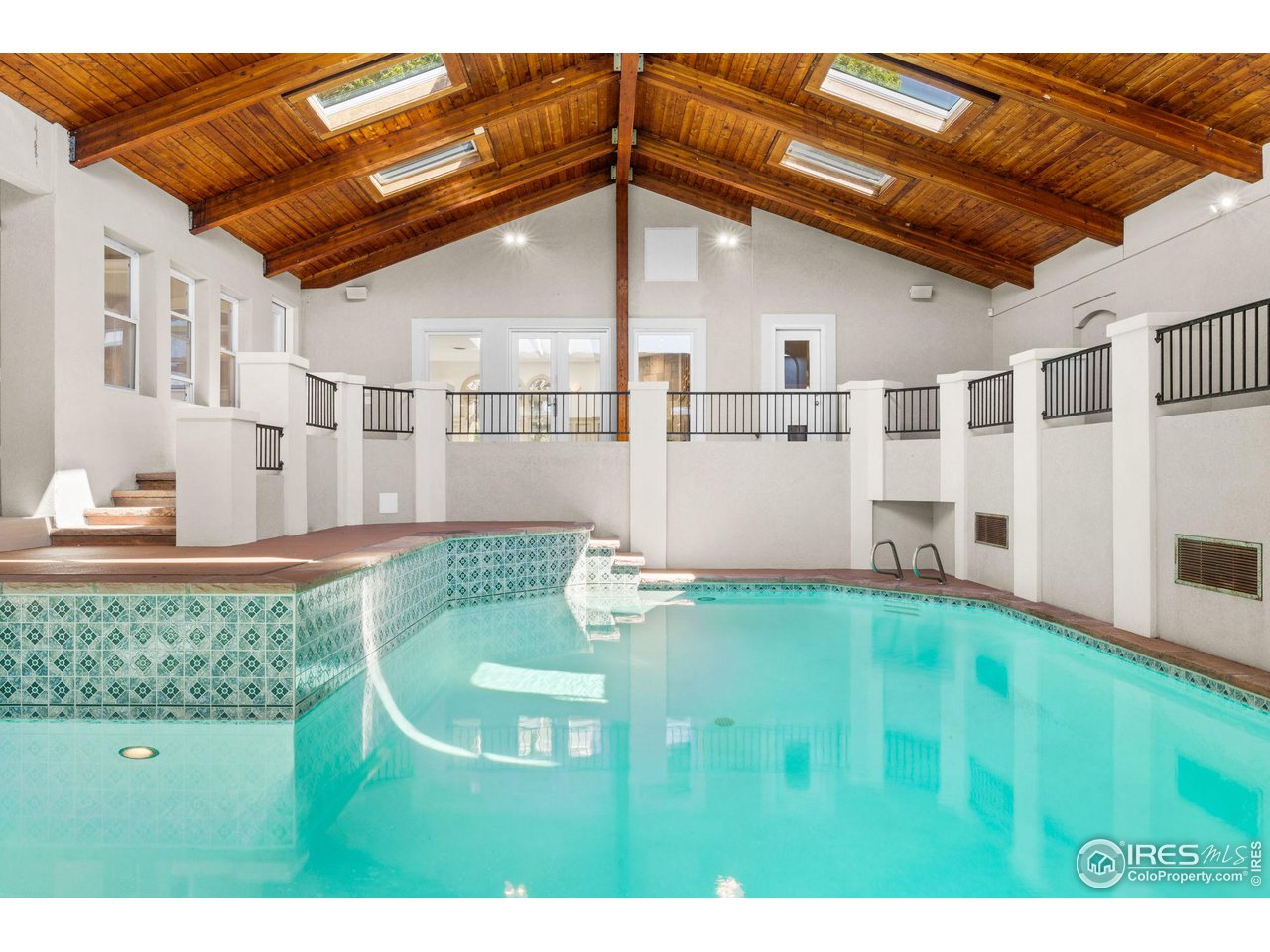 2210 Meadow Avenue Boulder, CO 80304 - Photo 17 of 40 a backyard of a house with table and chairs