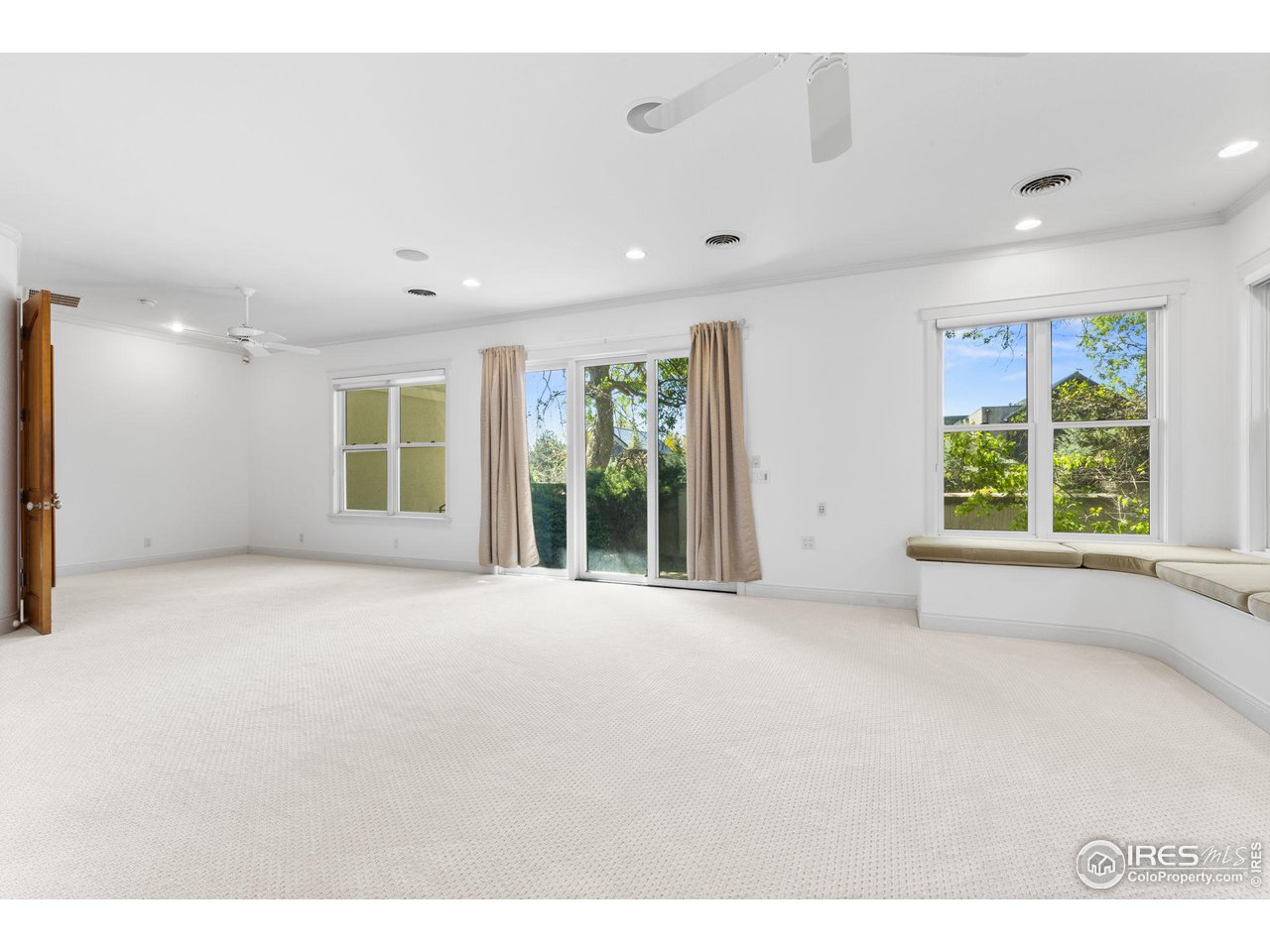 2210 Meadow Avenue Boulder, CO 80304 - Photo 24 of 40 a view of an empty room with a window