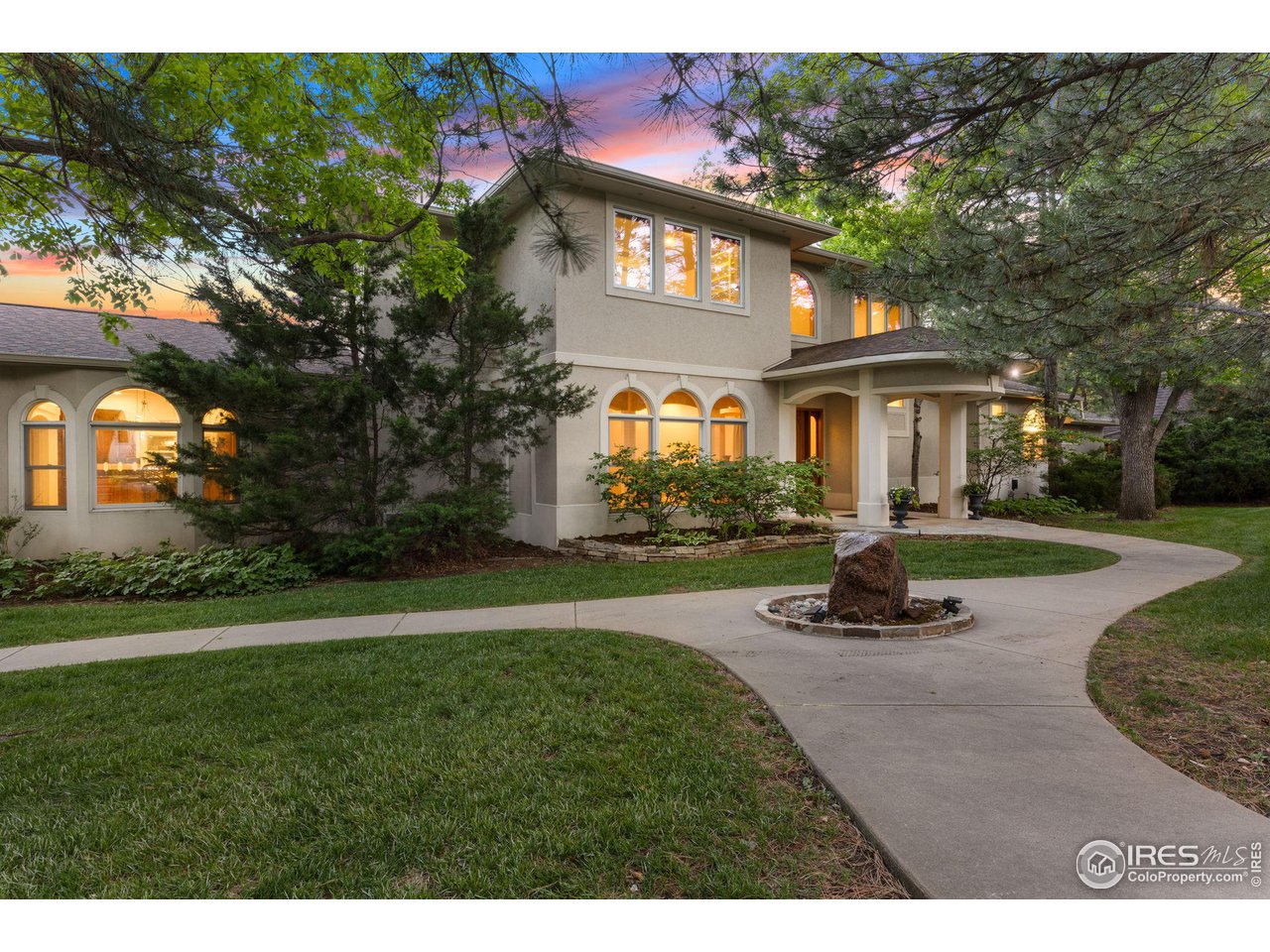 2210 Meadow Avenue Boulder, CO 80304 - Photo 3 of 40 a front view of a house with a yard