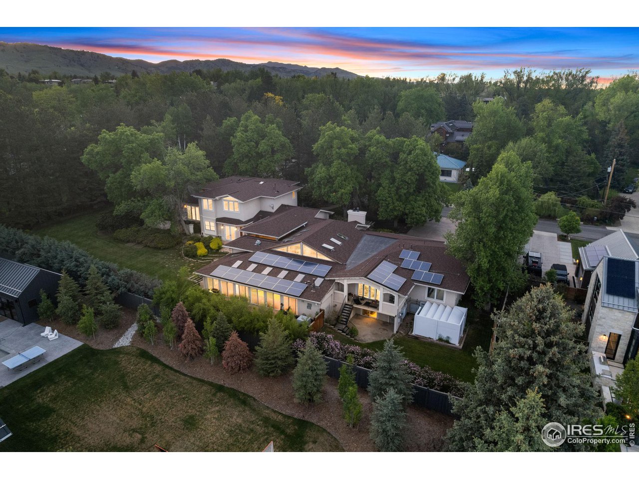 2210 Meadow Avenue Boulder, CO 80304 - Photo 4 of 40 a view of a city with lush green forest