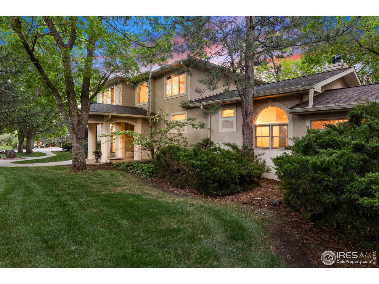 2210 Meadow Avenue Boulder, CO 80304 - Photo 5 of 40 a front view of a house with a garden