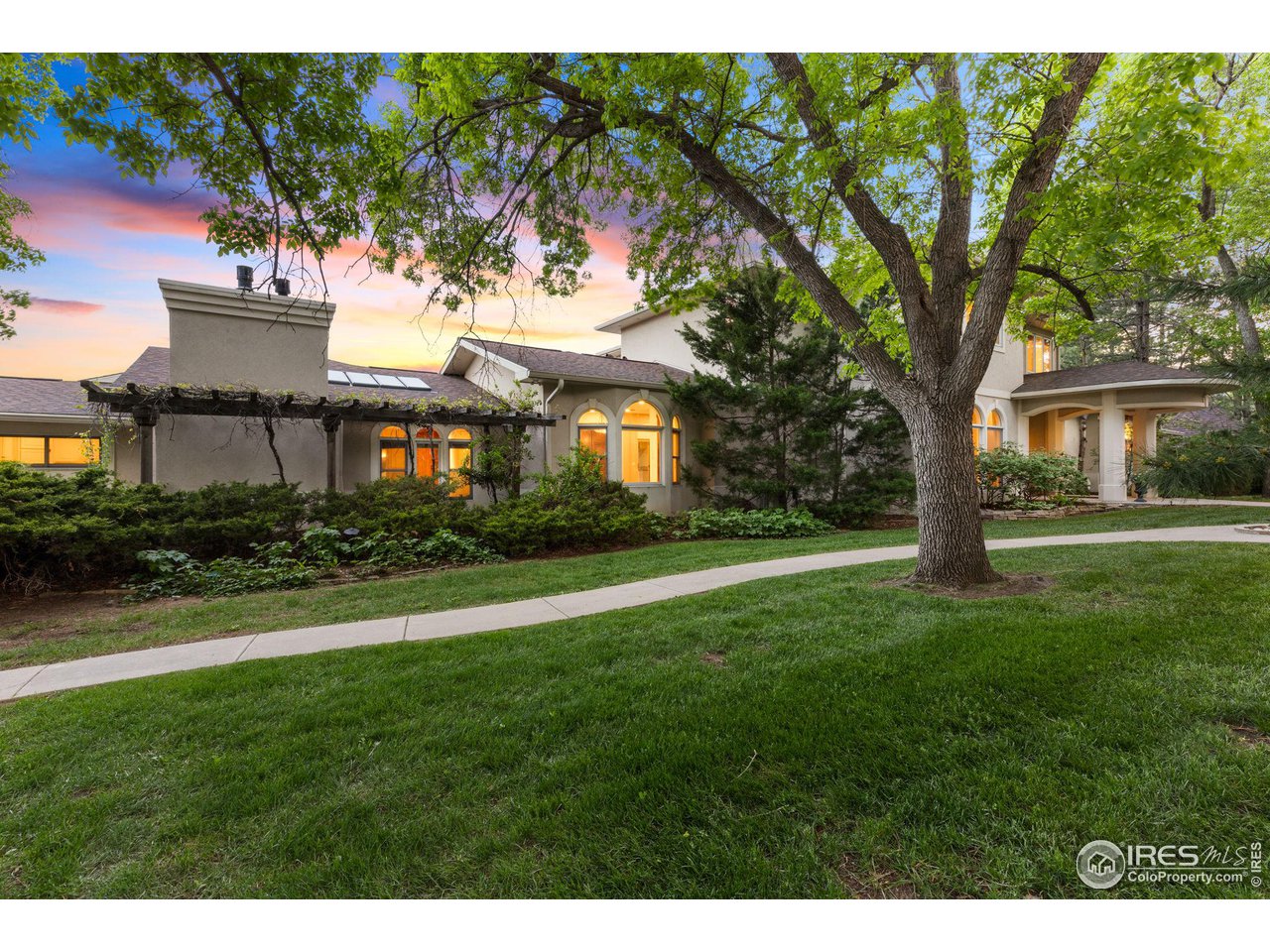 2210 Meadow Avenue Boulder, CO 80304 - Photo 6 of 40 a front view of a house with a yard