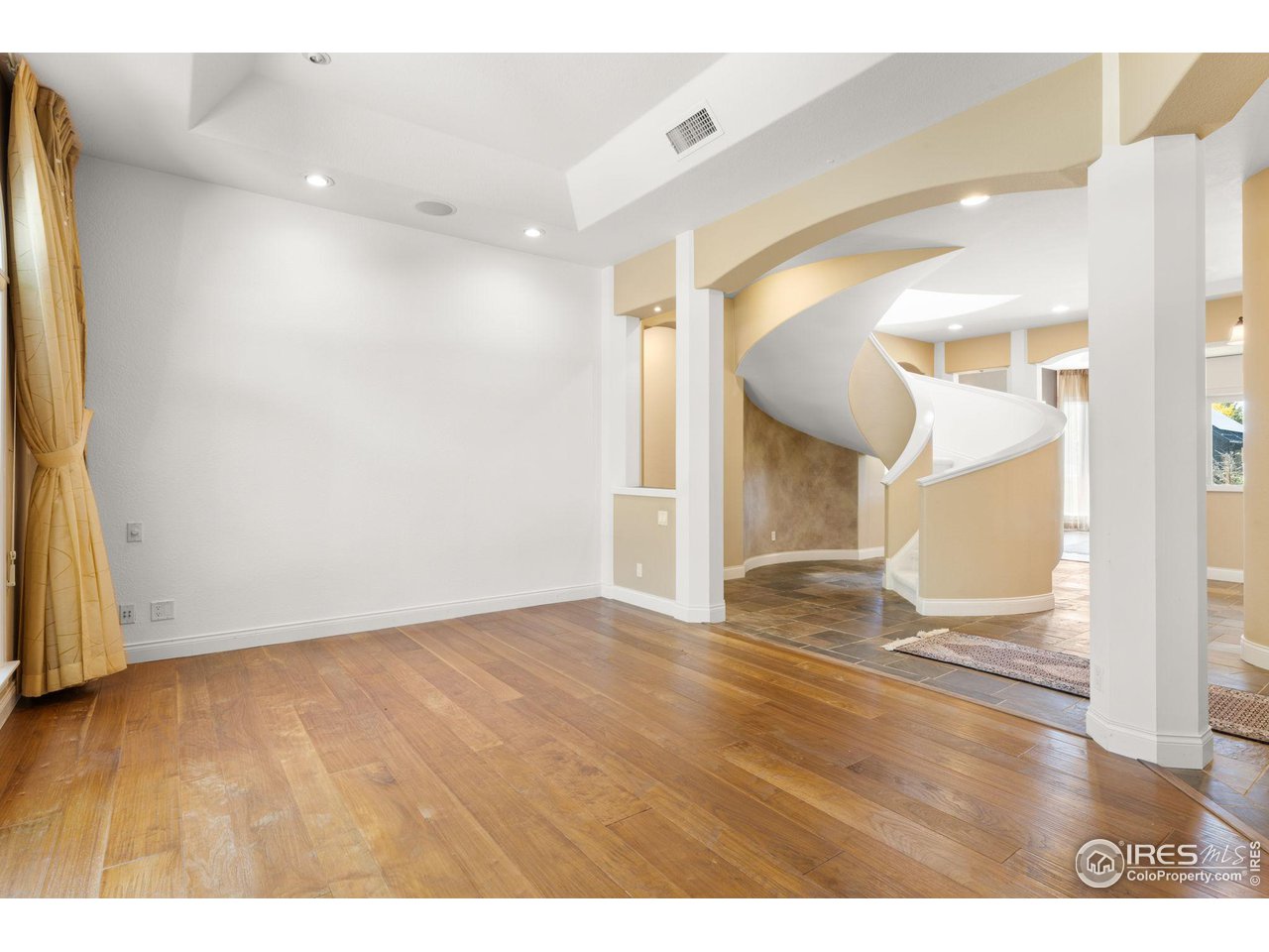 2210 Meadow Avenue Boulder, CO 80304 - Photo 8 of 40 a view of empty room with wooden floor