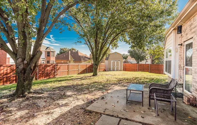 a house with trees in front of it