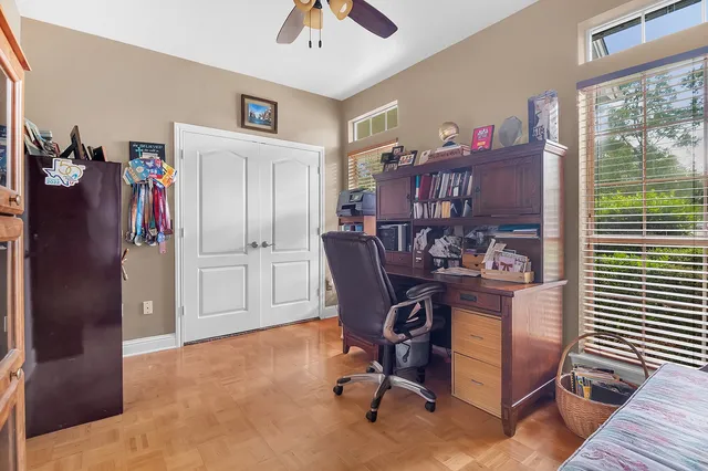 a white toilet sitting next to a shower curtain
