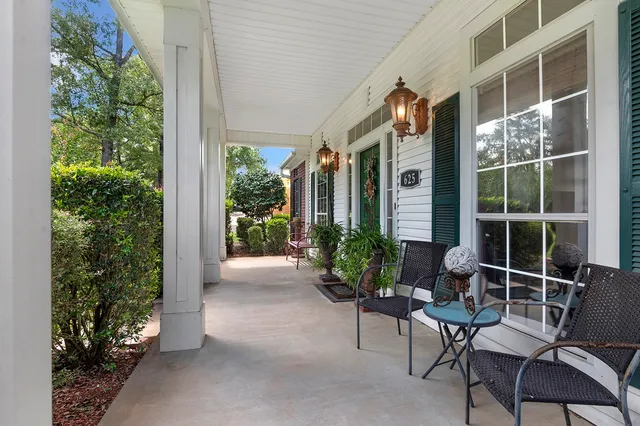 a view of an chair and table in the balcony