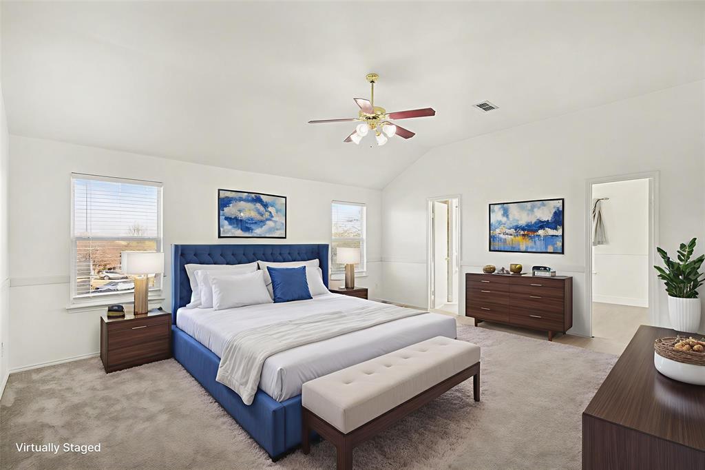 415 Hidden Ridge Drive Burleson, TX 76028 - Photo 19 of 38 a spacious bedroom with a bed and furniture