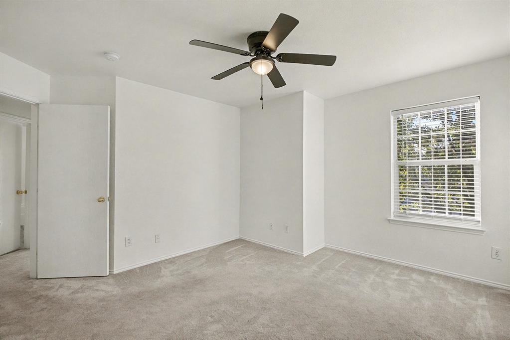 415 Hidden Ridge Drive Burleson, TX 76028 - Photo 27 of 38 a view of an empty room with a window