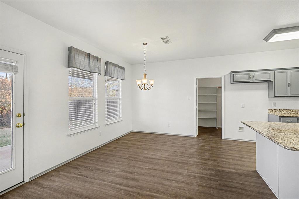 415 Hidden Ridge Drive Burleson, TX 76028 - Photo 9 of 38 a view of a kitchen with a sink and dishwasher kitchen view