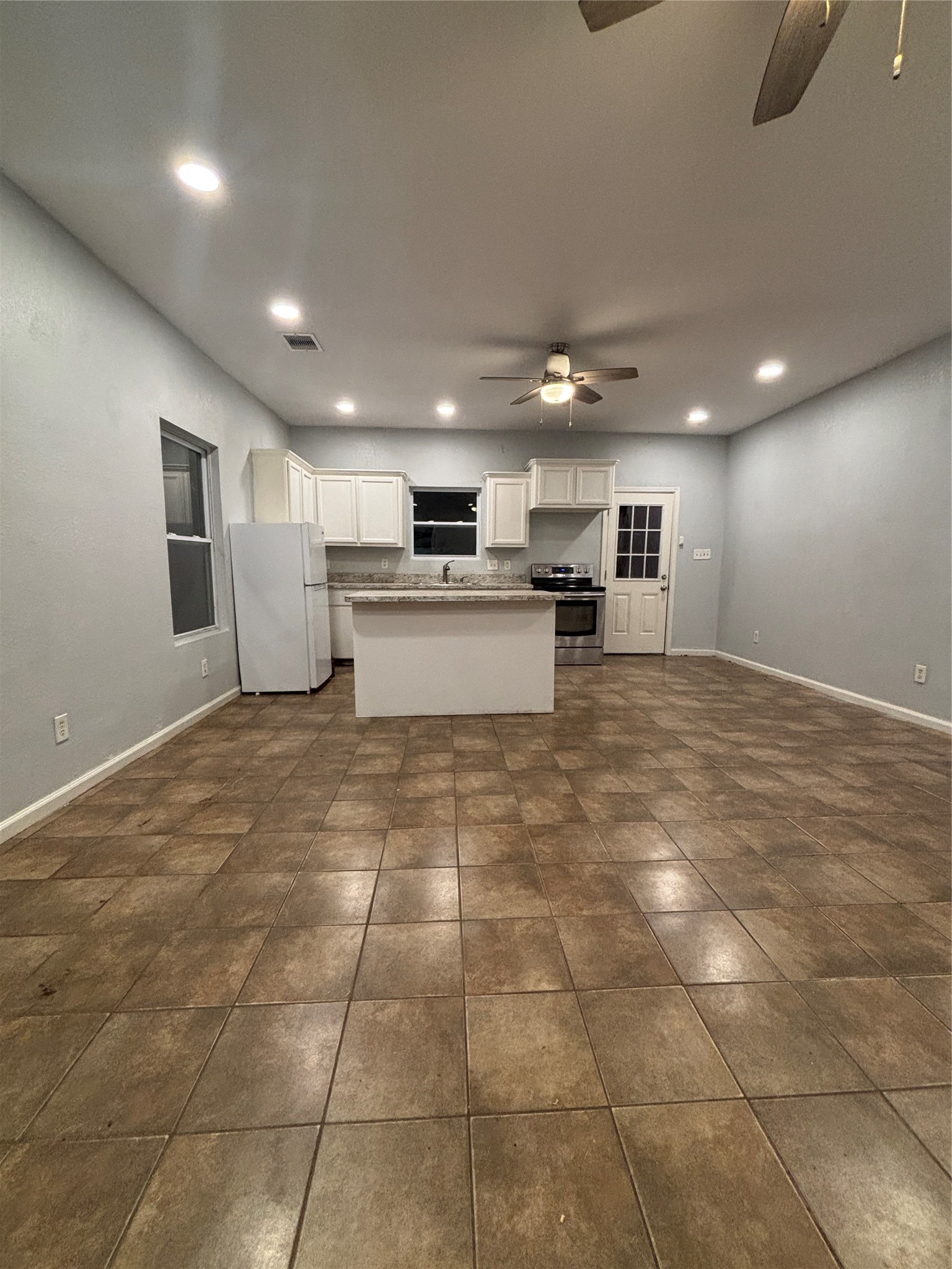 1615 Beech Drive Conroe, TX 77385 - Photo 3 of 14 Island kitchen open to living room!