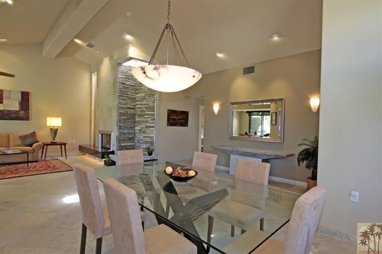 320 Red River Road Palm Desert, CA 92211 - Photo 11 of 31 a view of a dining room with furniture and a chandelier