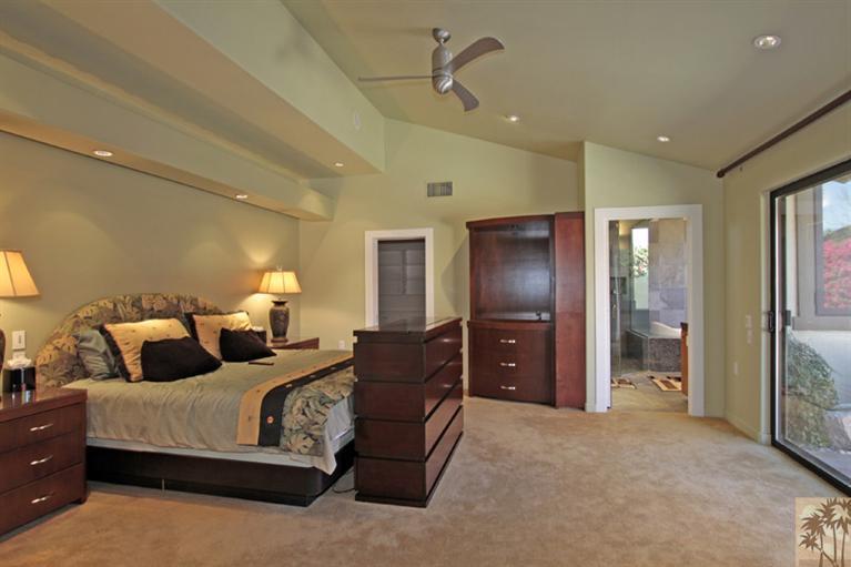 320 Red River Road Palm Desert, CA 92211 - Photo 14 of 31 a bedroom with bed and window