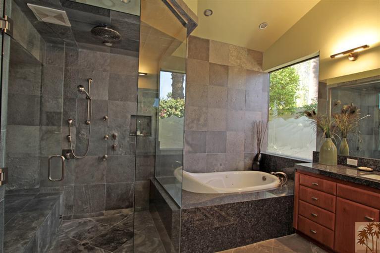 320 Red River Road Palm Desert, CA 92211 - Photo 18 of 31 a bathroom with a granite countertop sink a toilet and shower