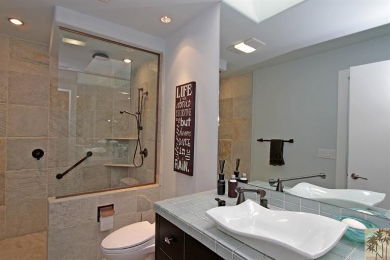 320 Red River Road Palm Desert, CA 92211 - Photo 20 of 31 a bathroom with a sink a toilet and shower