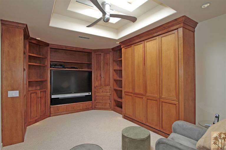 320 Red River Road Palm Desert, CA 92211 - Photo 23 of 31 a living room with furniture a ceiling fan and a rug