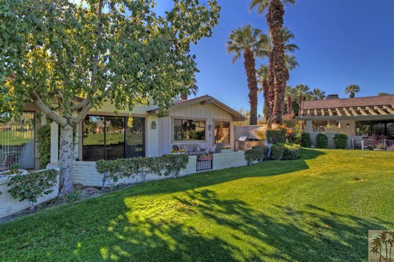 320 Red River Road Palm Desert, CA 92211 - Photo 28 of 31 a front view of a house with garden and patio