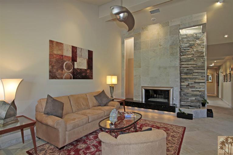 320 Red River Road Palm Desert, CA 92211 - Photo 6 of 31 a living room with furniture and a fireplace