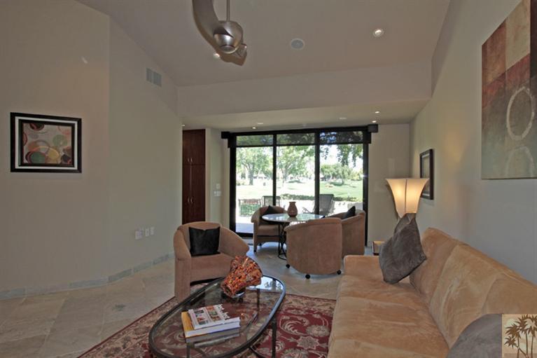 320 Red River Road Palm Desert, CA 92211 - Photo 7 of 31 a living room with furniture and large windows