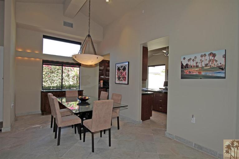 320 Red River Road Palm Desert, CA 92211 - Photo 10 of 31 a dining room with furniture a chandelier and window