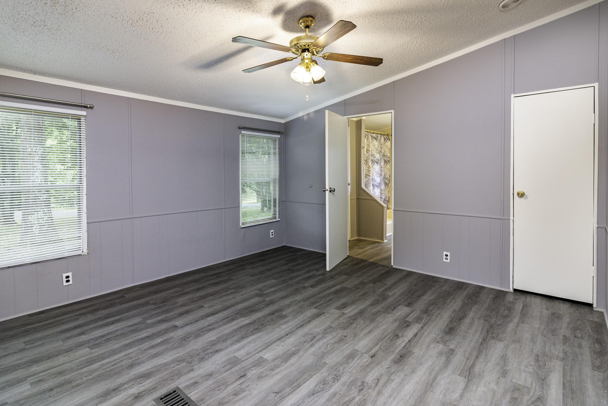 2583 Double Branch Road Columbia, TN 38401 - Photo 12 of 17 a view of an empty room with a window and wooden floor