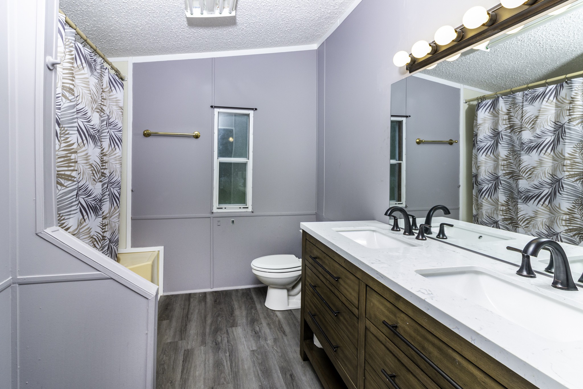 2583 Double Branch Road Columbia, TN 38401 - Photo 13 of 17 a bathroom with a sink a toilet and a mirror