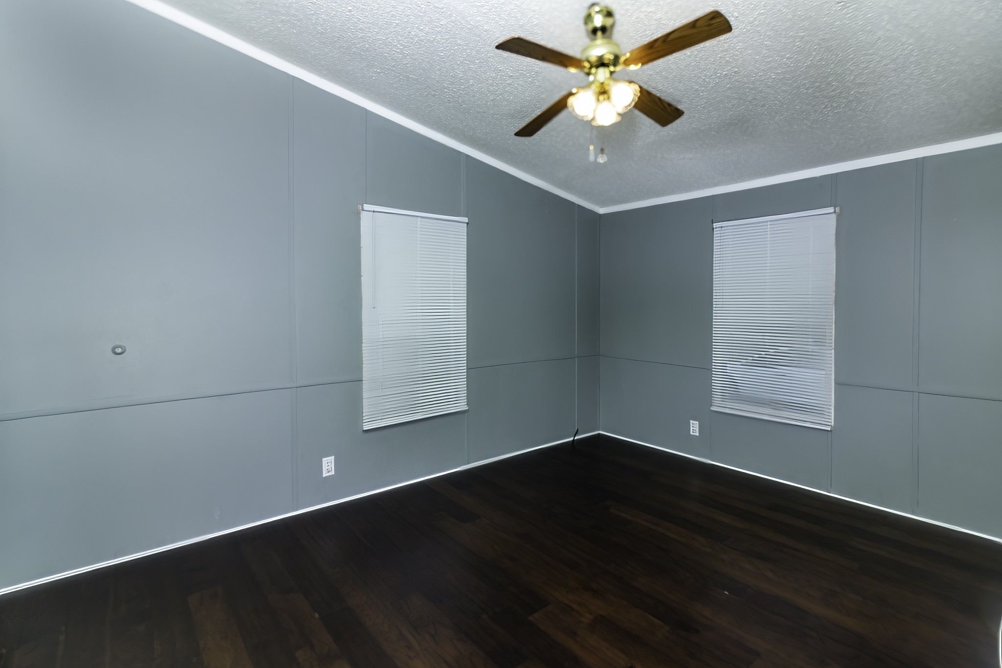 2583 Double Branch Road Columbia, TN 38401 - Photo 14 of 17 an empty room with wooden floor and fan