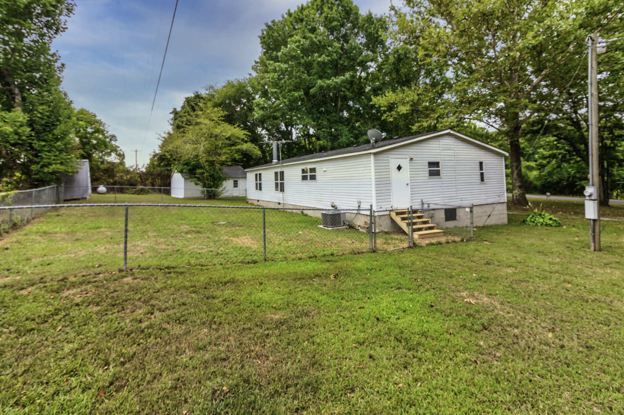 2583 Double Branch Road Columbia, TN 38401 - Photo 4 of 17 a backyard of a house with lots of green space