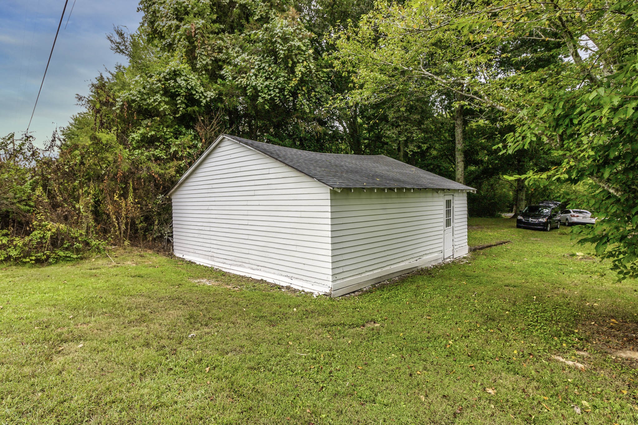 2583 Double Branch Road Columbia, TN 38401 - Photo 7 of 17 a view of a house with a backyard