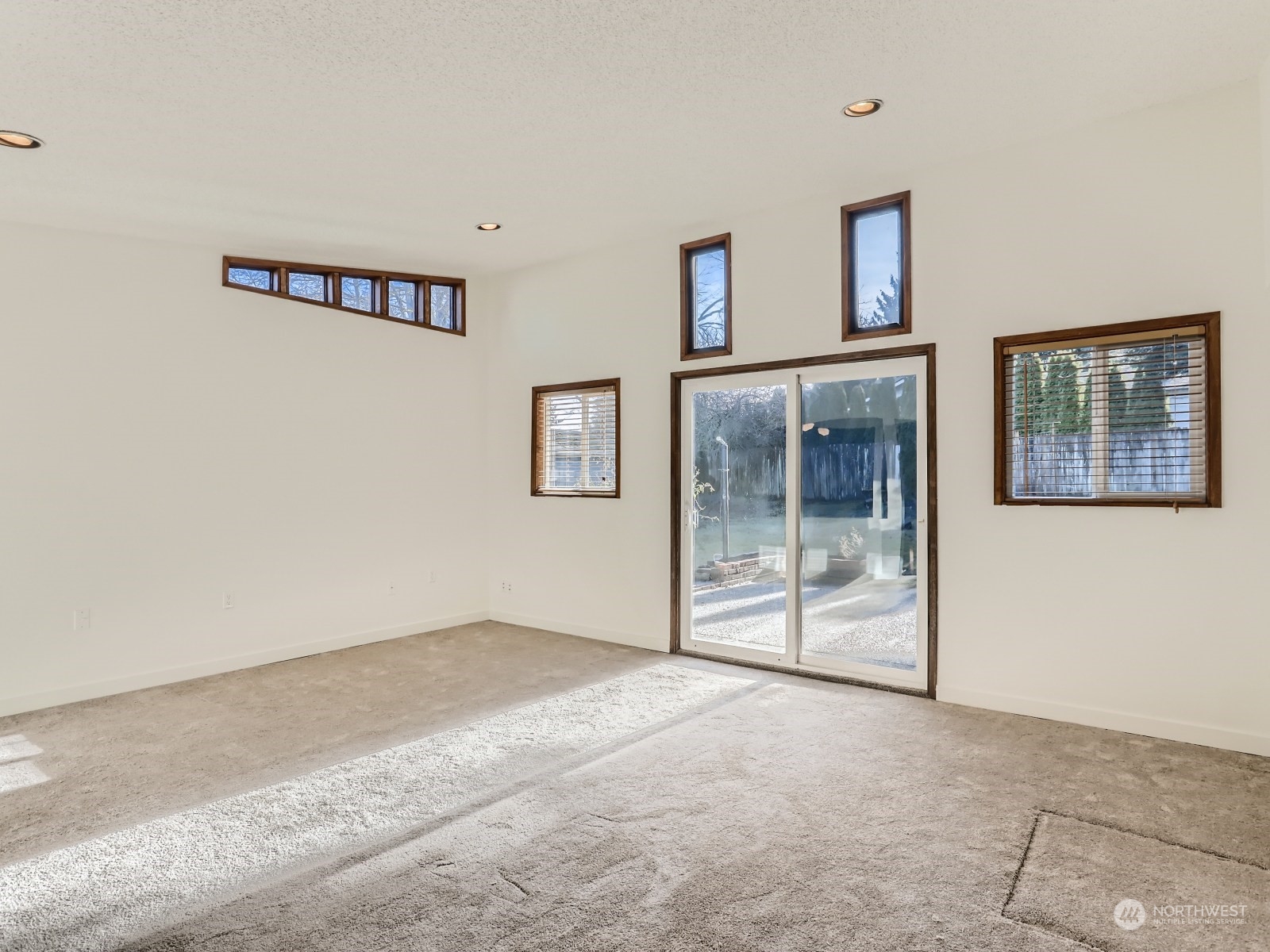 22031 7th Avenue West Bothell, WA 98021 - Photo 14 of 30 a view of an empty room with glass door