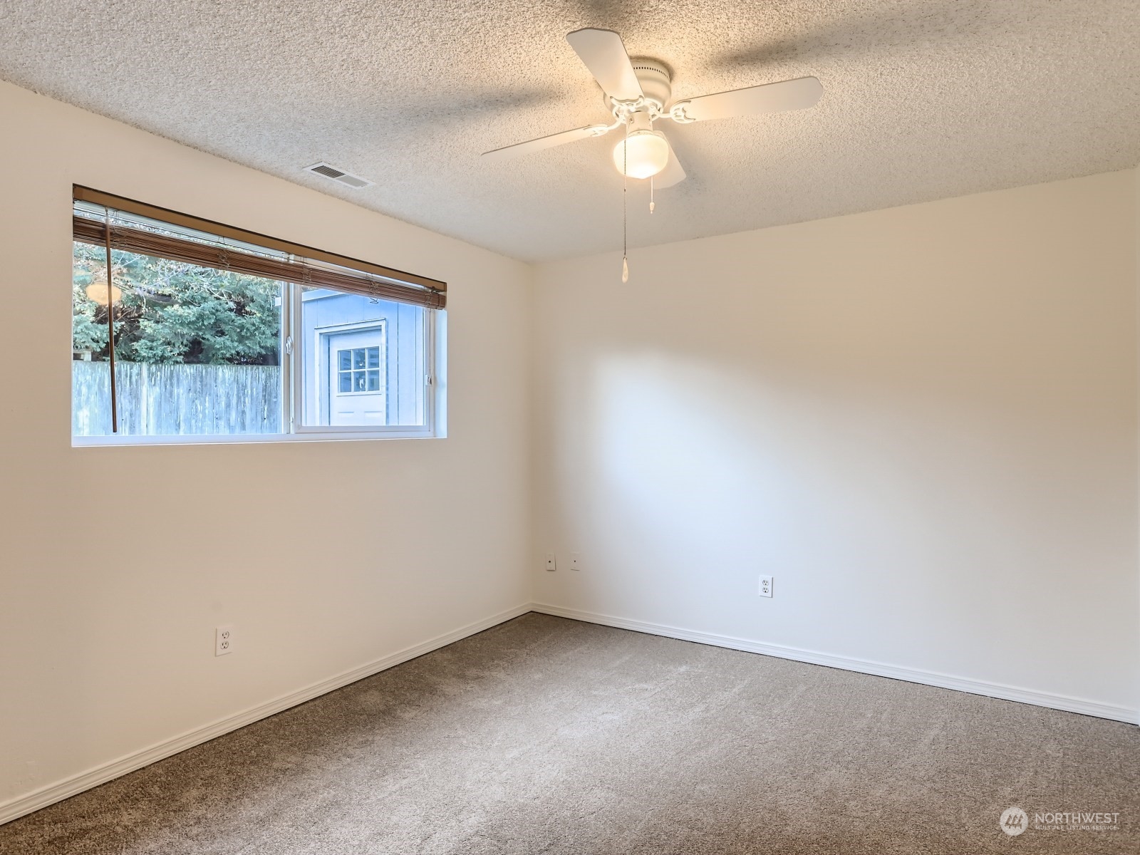 22031 7th Avenue West Bothell, WA 98021 - Photo 19 of 30 an empty room with a window