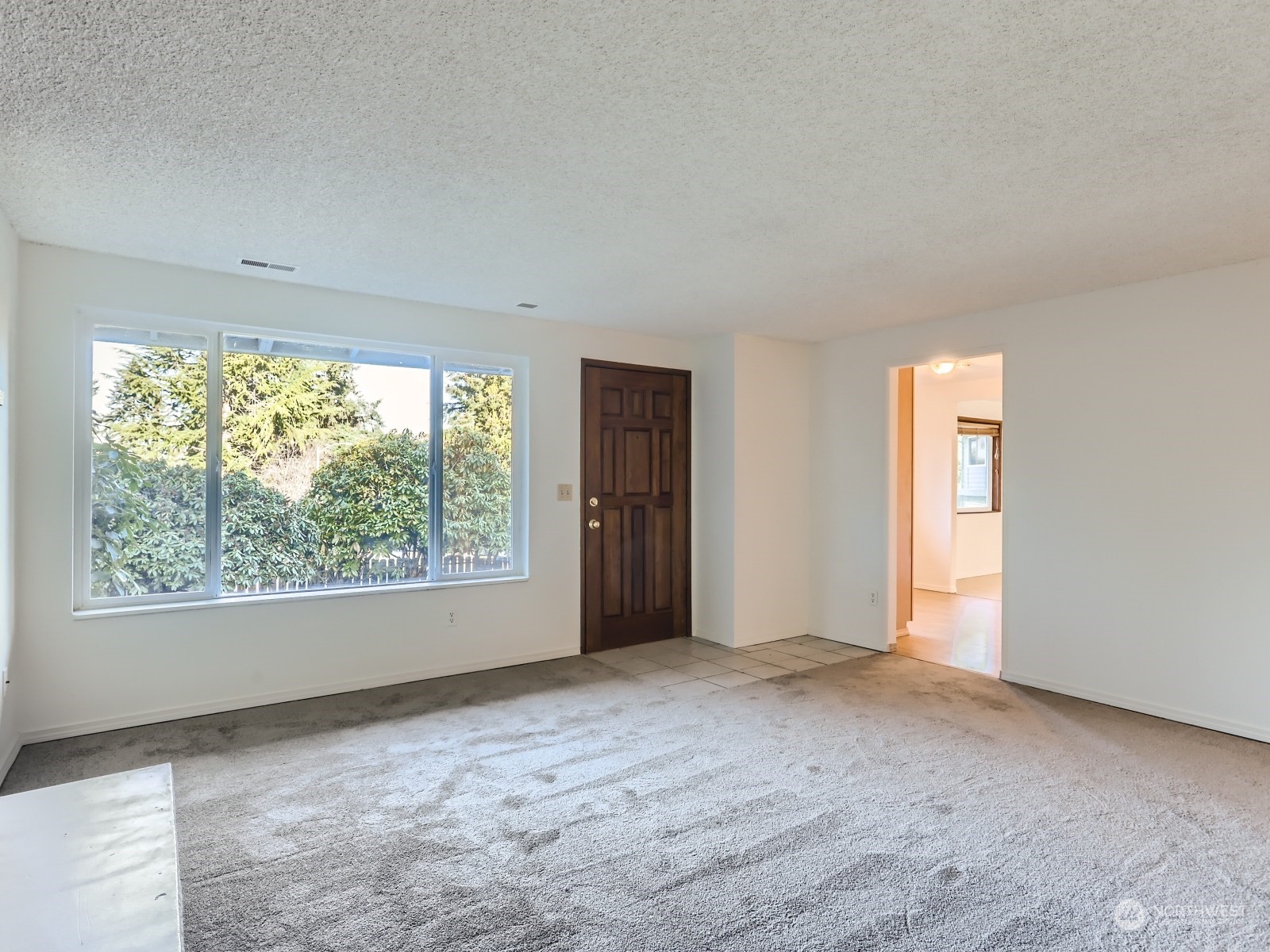 22031 7th Avenue West Bothell, WA 98021 - Photo 5 of 30 a view of an empty room with a window