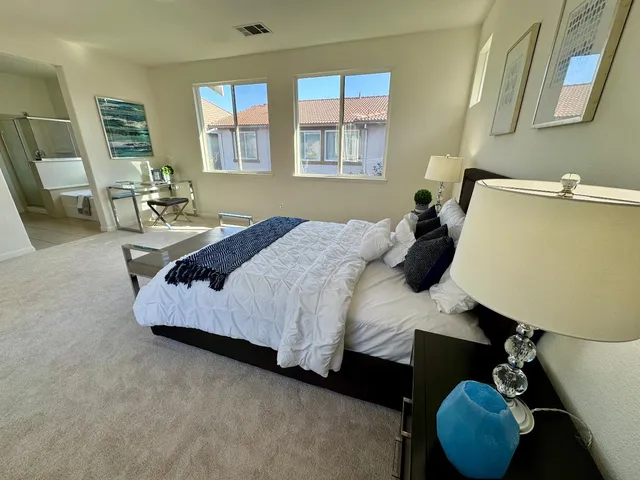 a bathroom with a sink a mirror and a toilet