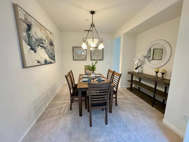 a view of an empty room and a window