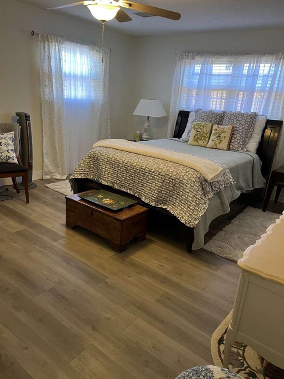 3212 40th Street Lubbock, TX 79413 - Photo 6 of 6 a bedroom with a bed and window