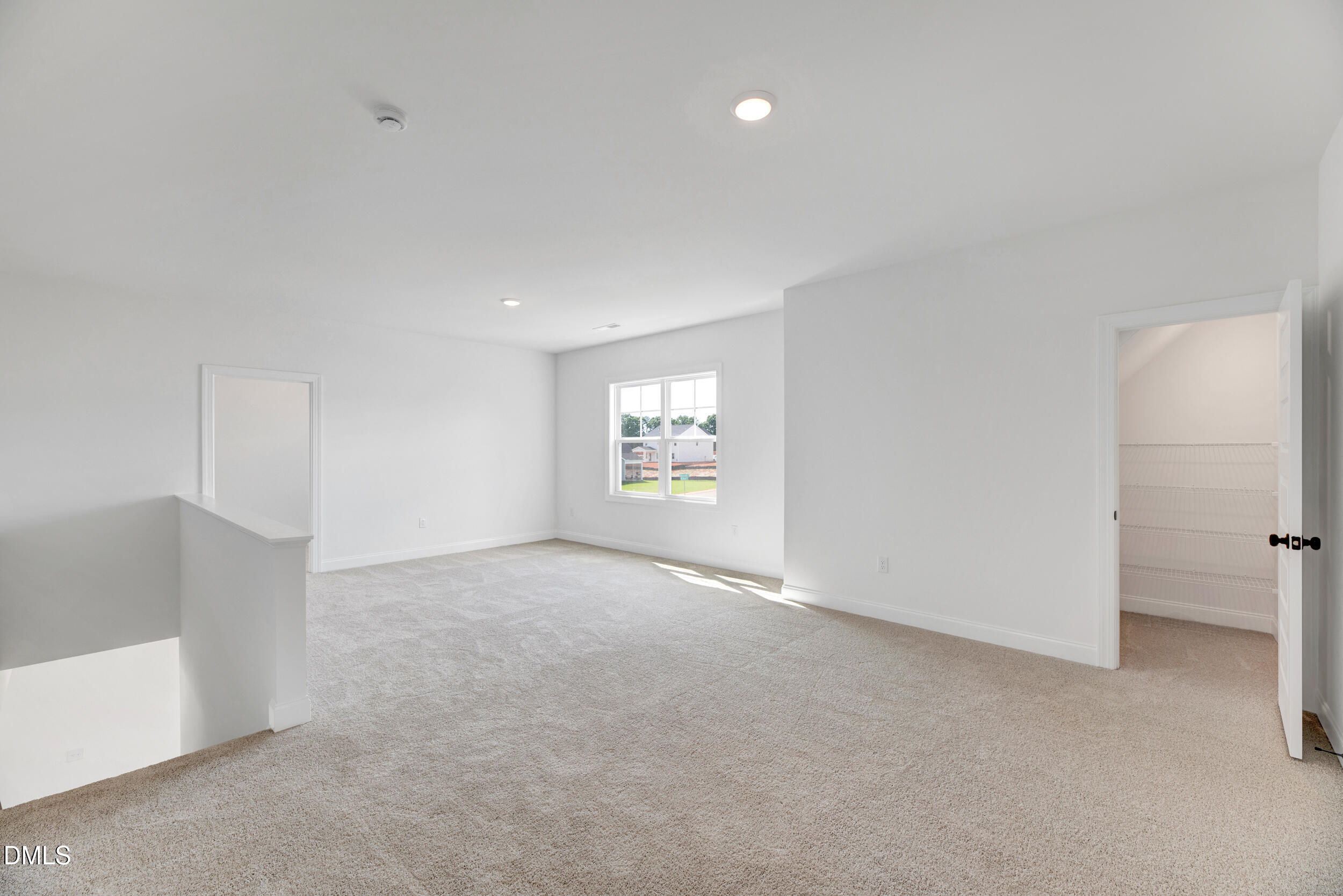 467 Ravensworth Drive Garner, NC 27529 - Photo 16 of 27 a view of an empty room with a window