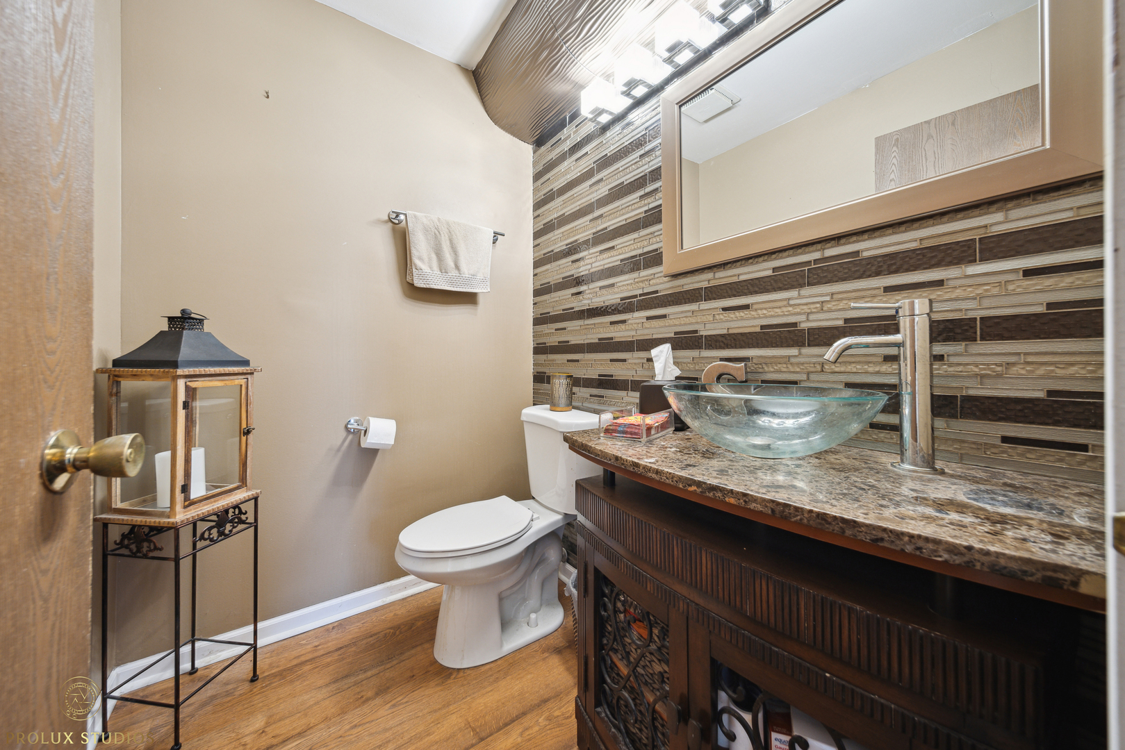 848 Willowbrook Drive Wheeling, IL 60090 - Photo 11 of 23 a bathroom with a granite countertop sink and a toilet