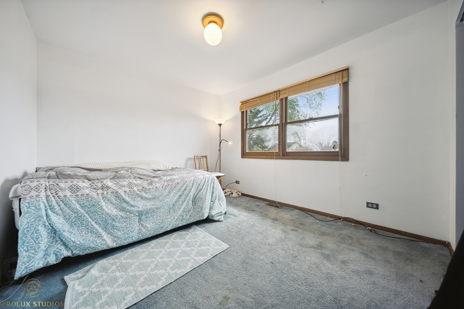 848 Willowbrook Drive Wheeling, IL 60090 - Photo 16 of 23 a bedroom with a bed and a window