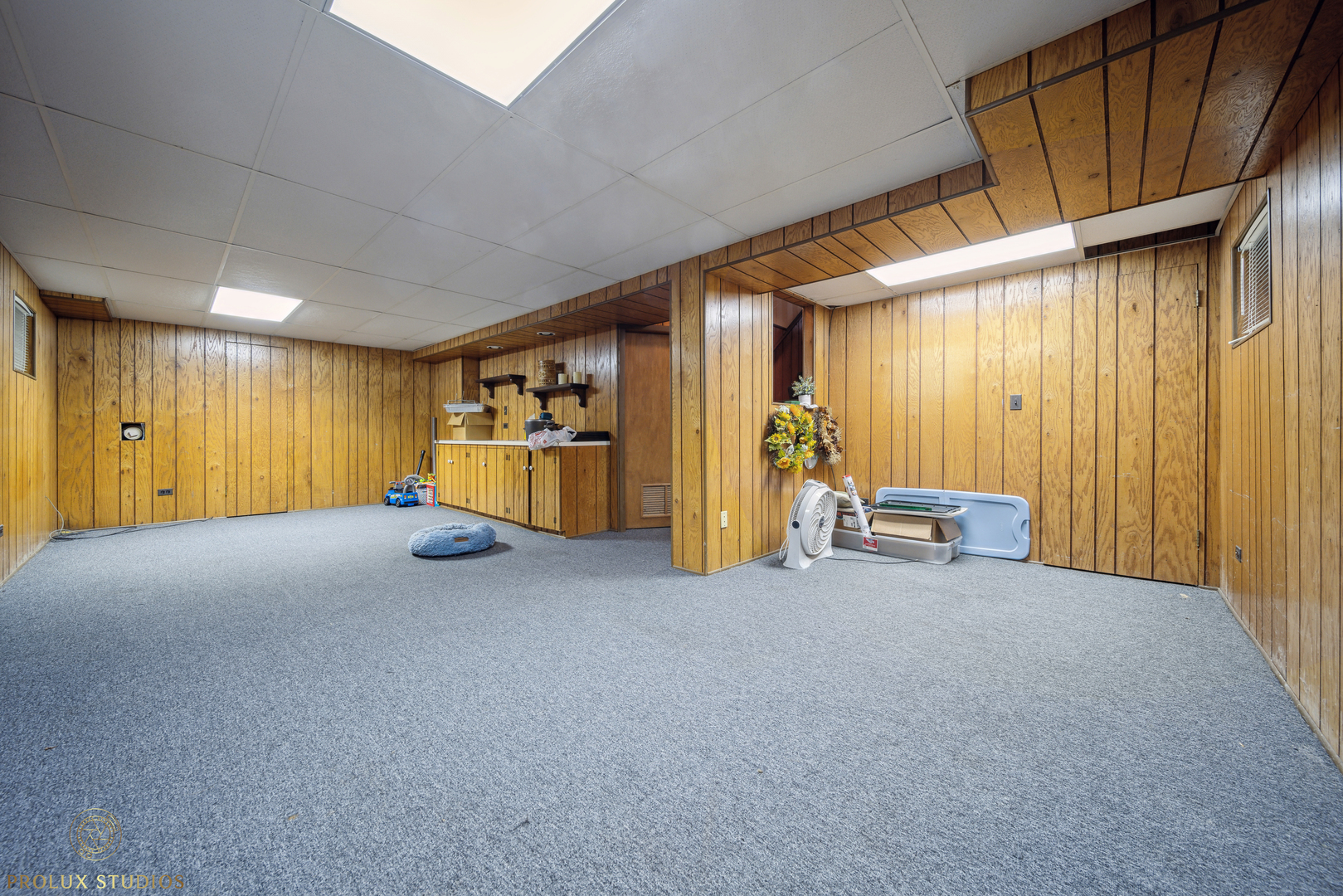 848 Willowbrook Drive Wheeling, IL 60090 - Photo 17 of 23 a view of an empty room with furniture and a window