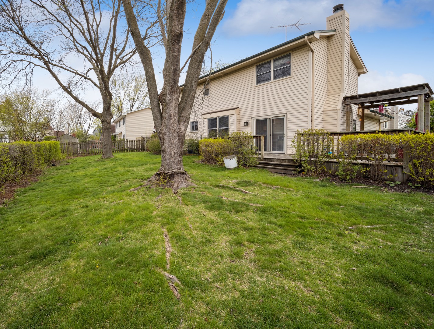 848 Willowbrook Drive Wheeling, IL 60090 - Photo 19 of 23 a view of a house with a yard