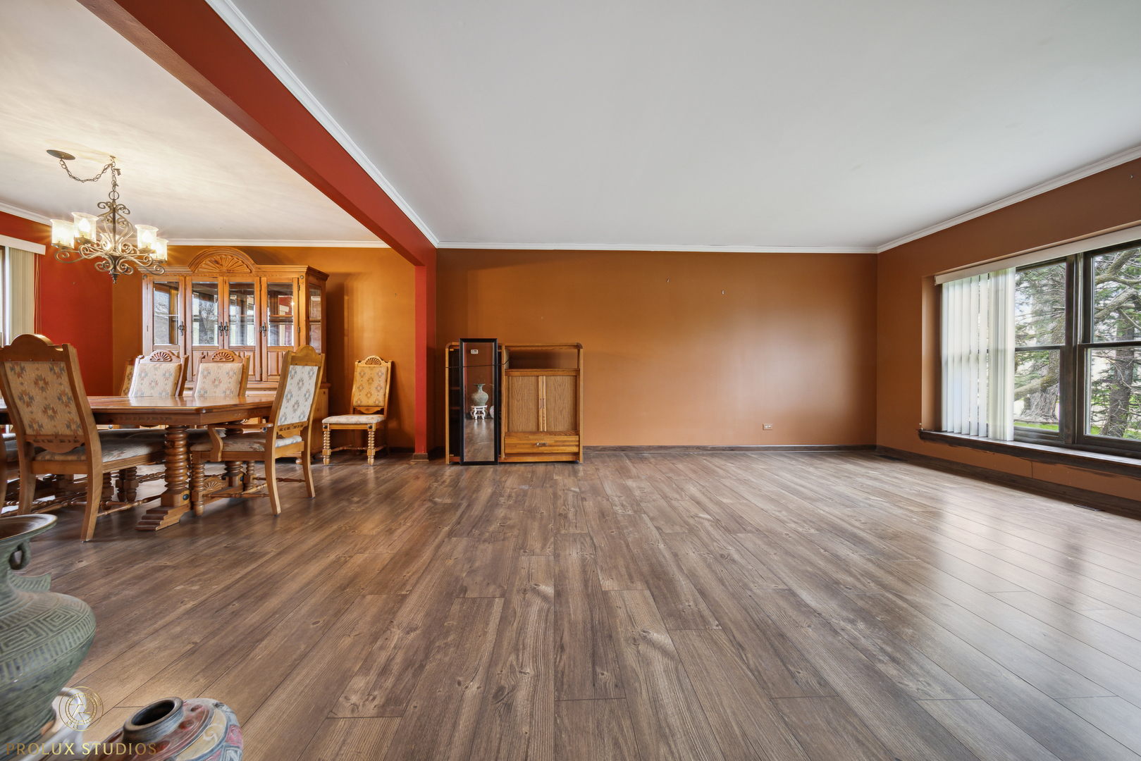 848 Willowbrook Drive Wheeling, IL 60090 - Photo 3 of 23 a view of empty room with wooden floor and fan