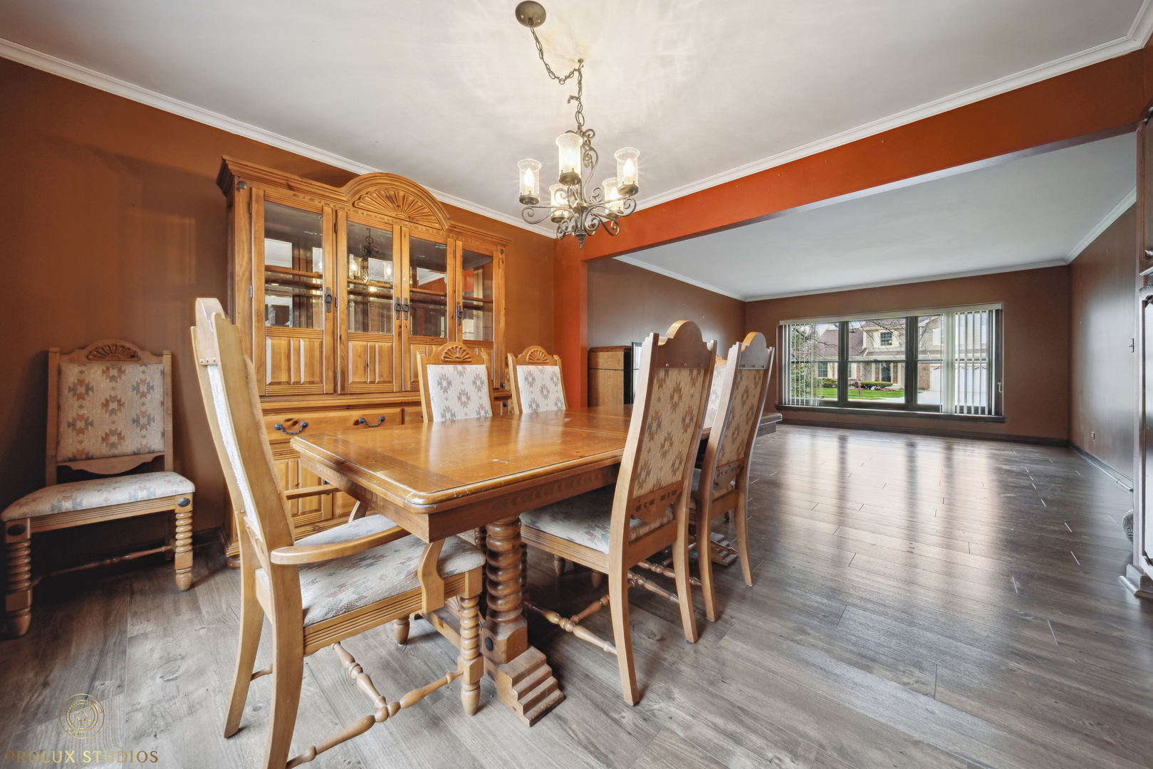 848 Willowbrook Drive Wheeling, IL 60090 - Photo 4 of 23 a view of a dining room with furniture wooden floor and chandelier