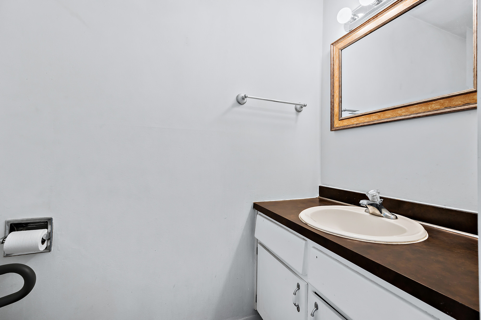 1105 Rhodes Court Wheaton, IL 60189 - Photo 13 of 22 a bathroom with a granite countertop sink and a mirror