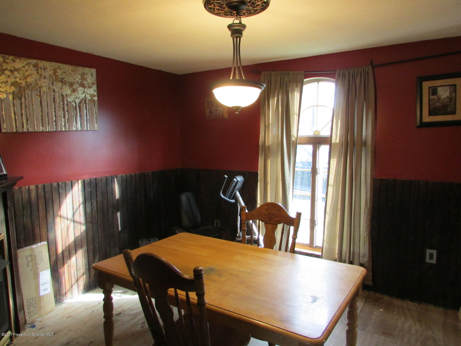 228 Ridge Road South Montrose, PA 18801 - Photo 9 of 20 a view of a dining room with furniture and a chandelier