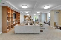 22 Liberty Drive, Unit 5L Boston, MA 02210 - Photo 8 of 17 a living room with furniture and a large window