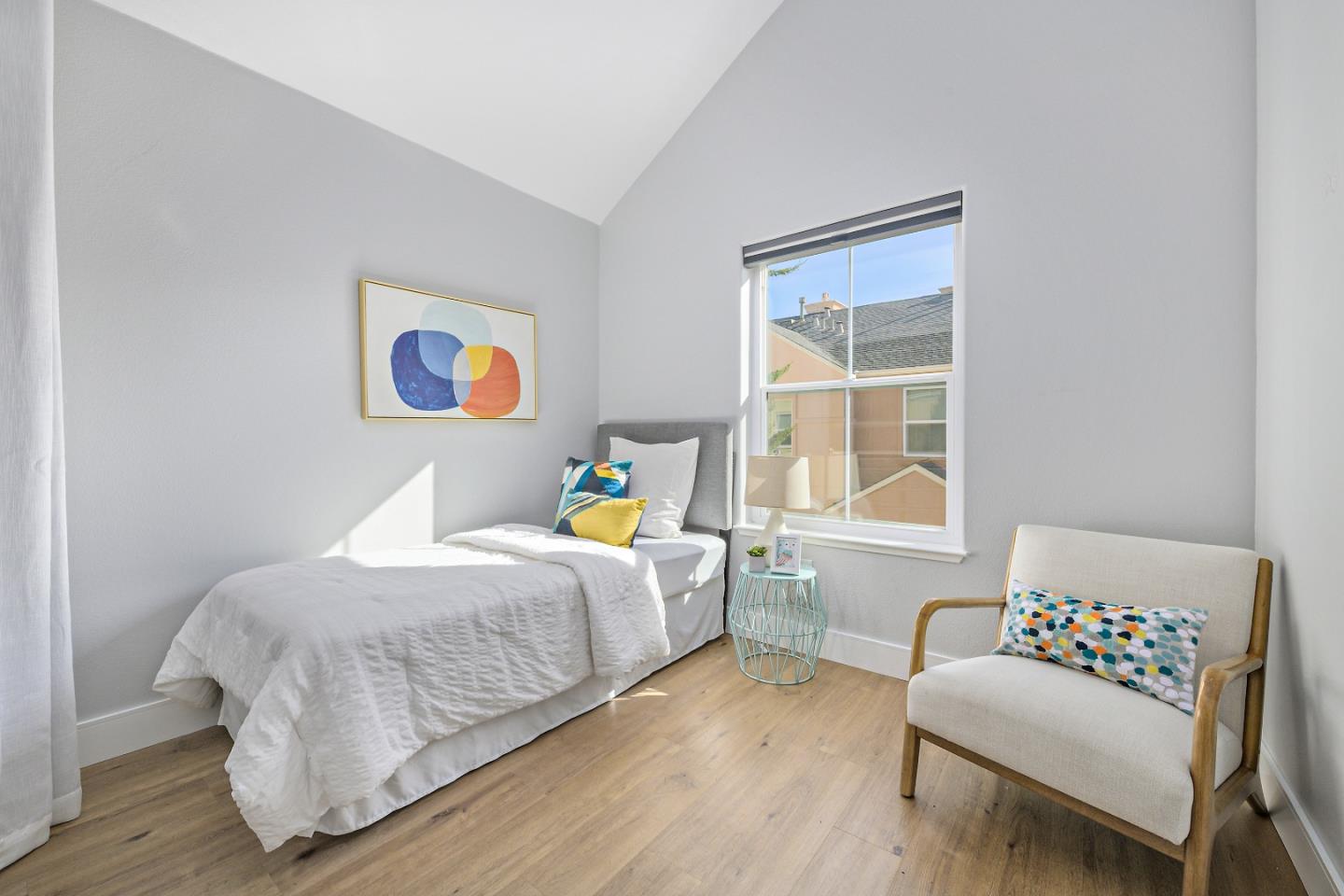 135 Pacchetti Way Mountain View, CA 94040 - Photo 12 of 27 a bedroom with a bed and wooden floor