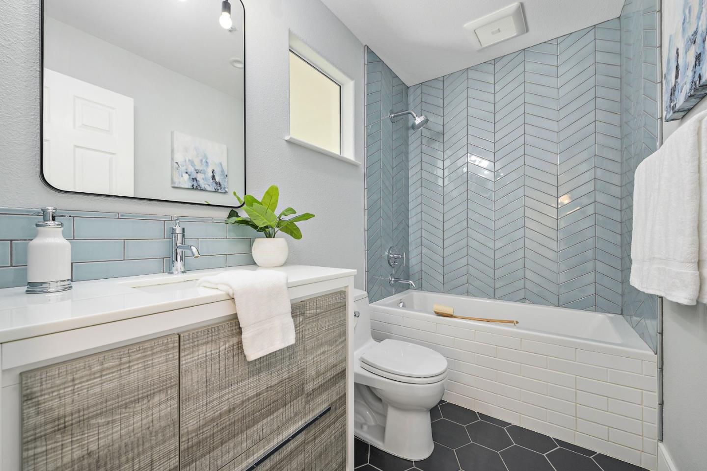 135 Pacchetti Way Mountain View, CA 94040 - Photo 14 of 27 a bathroom with a sink a toilet and shower